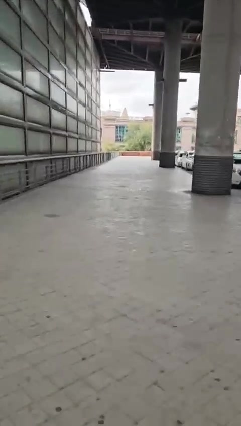 Continue down the covered walkway